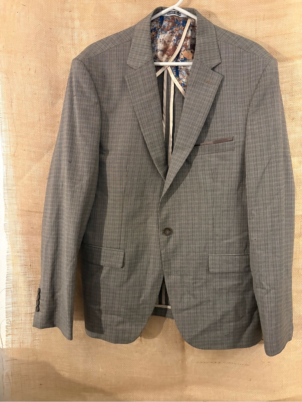 Marco Milano notch lapel blazer in a gray and white micro-plaid pattern.